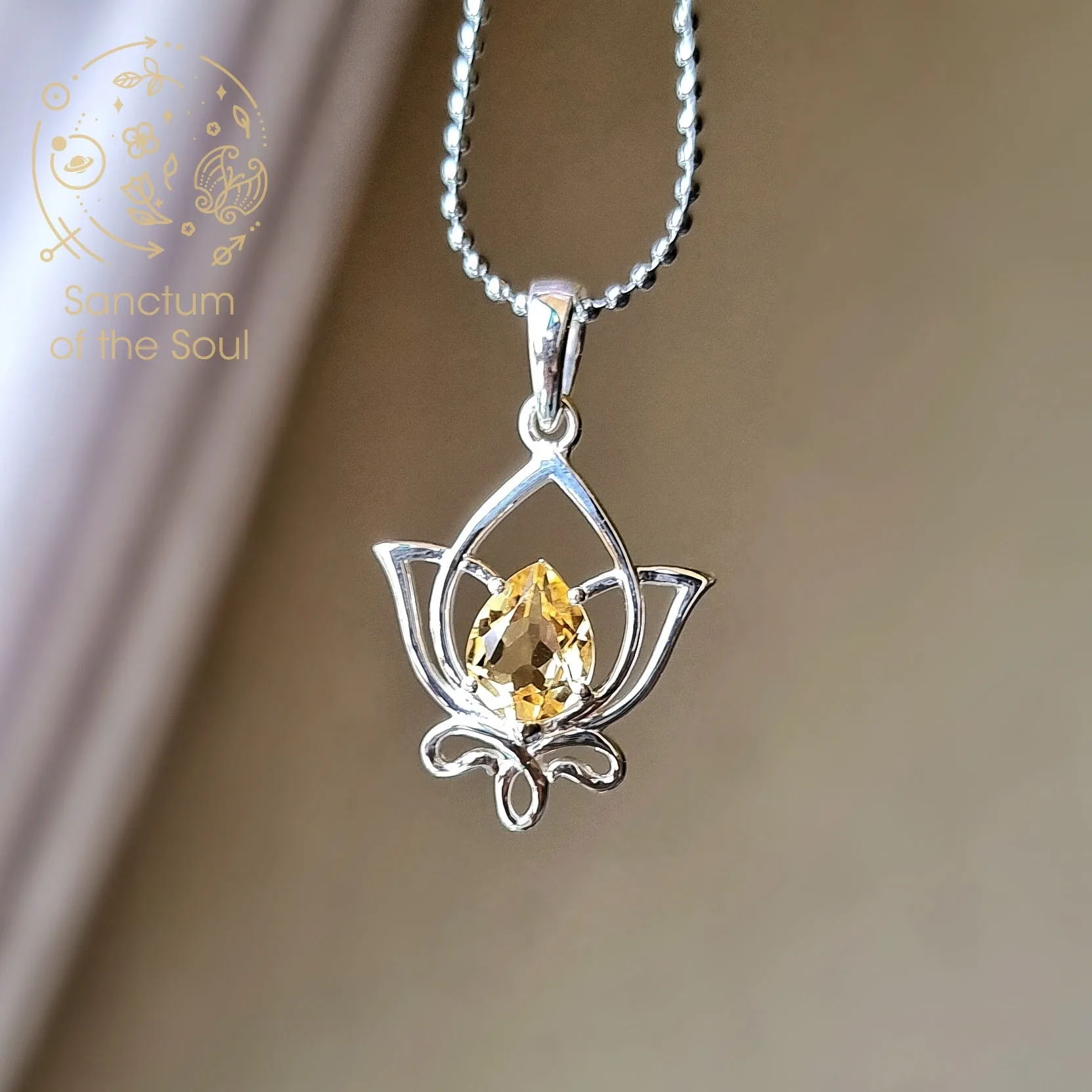 Faceted Citrine in Silver Lotus Pendant